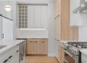 Thumbnail 4 of 28 - Kitchen with Abundant Storage Space