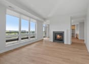 Thumbnail 12 of 32 - Spacious Living Area with Fireplace