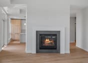Thumbnail 13 of 32 - Living Room with Fireplace