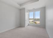 Thumbnail 15 of 32 - Bedroom with Large Window