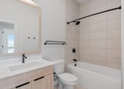 Thumbnail 19 of 32 - Bathroom with Tiled Shower