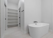 Thumbnail 25 of 32 - Bathroom with Freestanding Tub