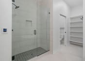 Thumbnail 26 of 32 - Bathroom with Tiled Shower