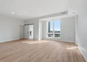 Thumbnail 7 of 28 - Spacious Living Area with Luxury Wood-Style Flooring
