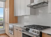Thumbnail 27 of 32 - Kitchen with Premium Fixtures and Finishes