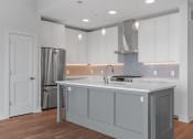 Thumbnail 2 of 27 - Kitchen with Premium Fixtures and Finishes