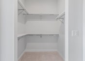 Thumbnail 13 of 27 - Walk-In Closet With Built-In Shelving