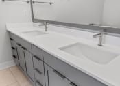 Thumbnail 18 of 27 - Bathroom Counter with Two Sinks