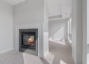 Thumbnail 10 of 28 - Den Area with Fireplace