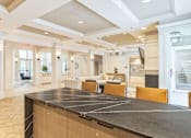 Thumbnail 15 of 33 - Community Kitchen at AVIA Apartments On Alpha, Dallas