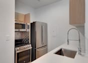 Thumbnail 4 of 12 - Kitchen Area at AVIA Apartments On Alpha, Dallas, Texas