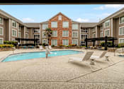 Thumbnail 23 of 33 - Resort style pool view at AVIA Apartments On Alpha, Dallas, TX, 75240