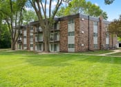 Thumbnail 3 of 20 - our apartments offer a spacious courtyard with green grass
