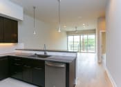Thumbnail 4 of 10 - Avana Austin apartment living room view from entrance