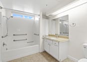 Thumbnail 17 of 48 - Large Handicap Accessible Bathroom with Full-Size Bathtub