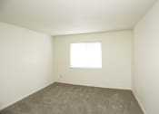 Thumbnail 10 of 36 - large carpeted bedroom with white walls and fresh grey carpet