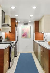 Spacious Bedroom with Vinyl Flooring, Recessed Lighting, and Closet with Shelving