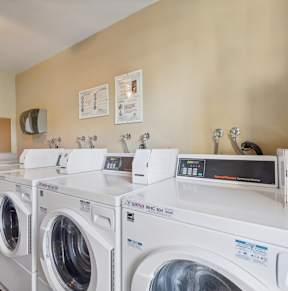 washing machines and dryers in the laundry room of a home
