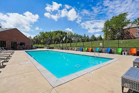 resort-style pool with spacious sundeck and available Wi-Fi