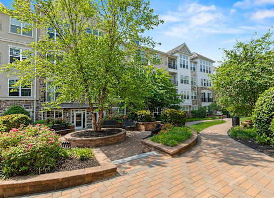 Outdoor Patio Seating Area at Heights at Glen Mills Apartments in Glen Mills, PA 19342