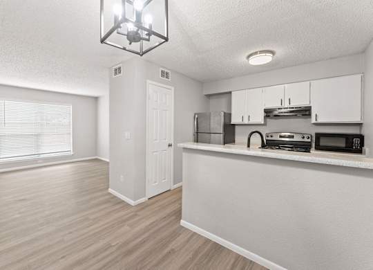 Kitchen with Counter at City-Base Vista, San Antonio, Texas