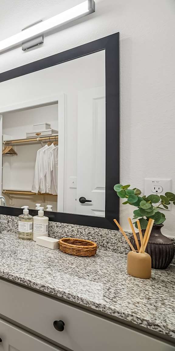 A bathroom with a white toilet, a white sink, and a white bathtub.