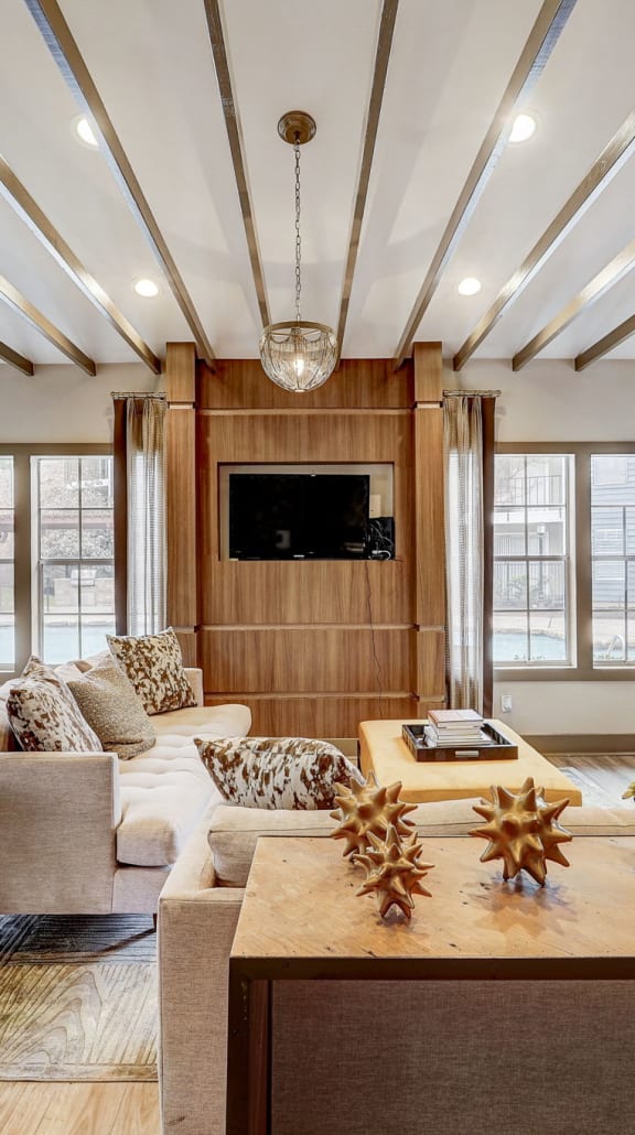 a living room with a couch and a table