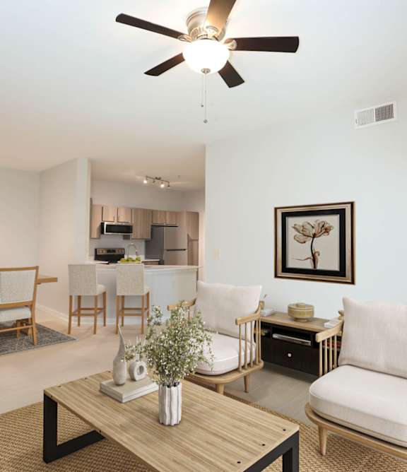 a pool with lounge chairs and umbrellas at the oxford at the boulevard apartments