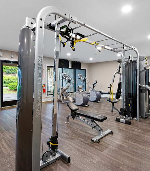 Gym with all equipment at Station Heights Apartments in Alpharetta, GA, 30022
