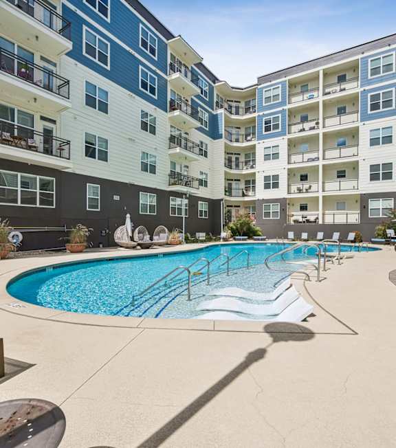 909 Flats Modern Apartments in Nashville, Tennessee Pool with Lounge Chairs
