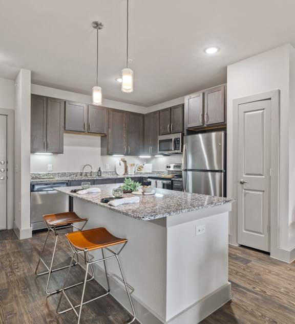 Axis Marketplace Apartments in Kyle, Texas Model Kitchen with Island