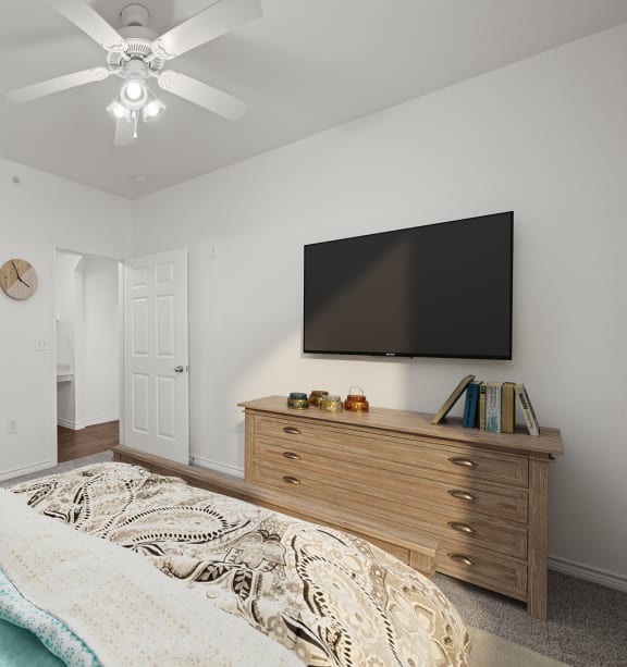 a living room and dining room with white furniture and a ceiling fan