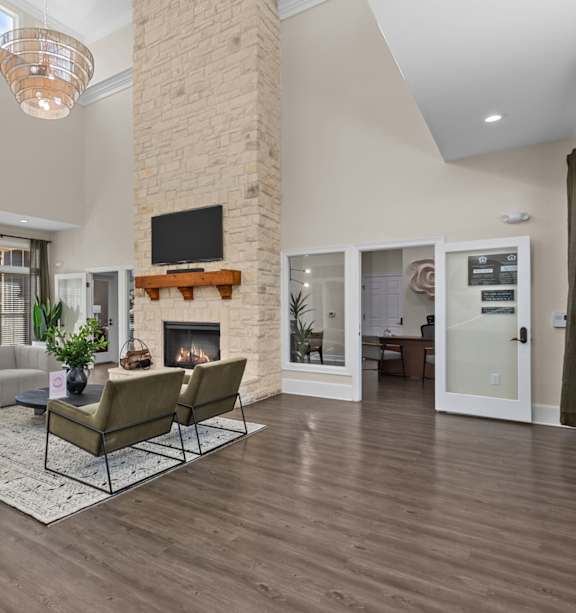 A living room with a fireplace and a couch.