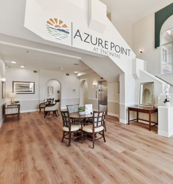 the living room and dining room of a zuber point apartments home