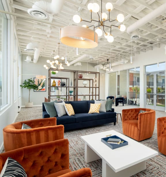 a room filled with furniture and a large window