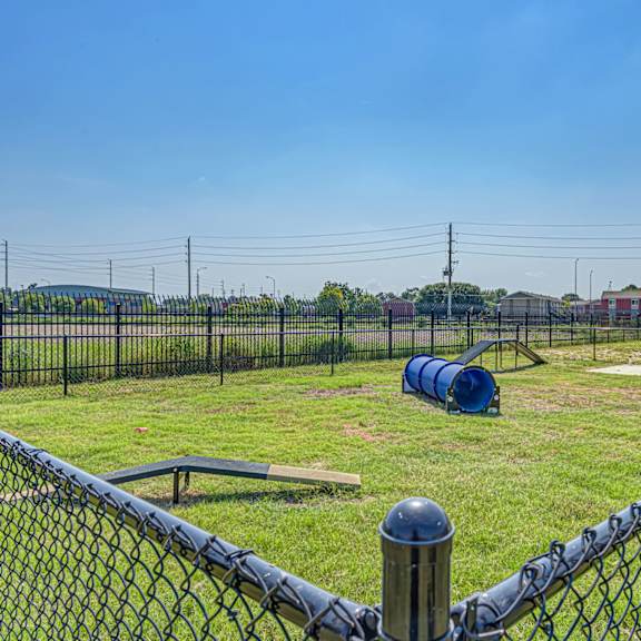 a fenced in dog park 