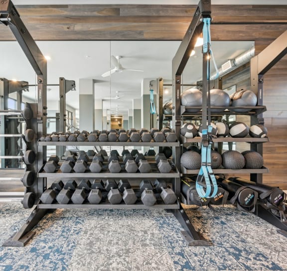 a pair of dumbbells sitting on a table at The Quarry, Fort Collins, CO