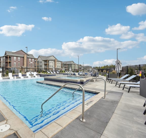 an aerial view of an apartment complex with a swimming pool at The Quarry, Colorado, 80526