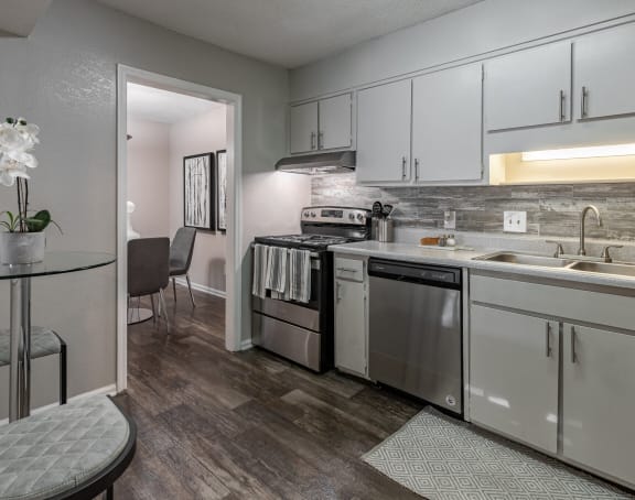 a bedroom with a bed and a mirror at Tucker Square, Stone Mountain, 30083