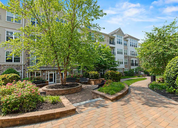 Outdoor Patio Seating Area at Heights at Glen Mills Apartments in Glen Mills, PA 19342