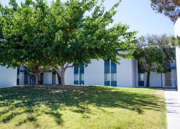 a building with trees in front of it