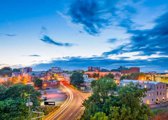 Building, roads and sky at Kingsbrook Arms, Colorado, 80113