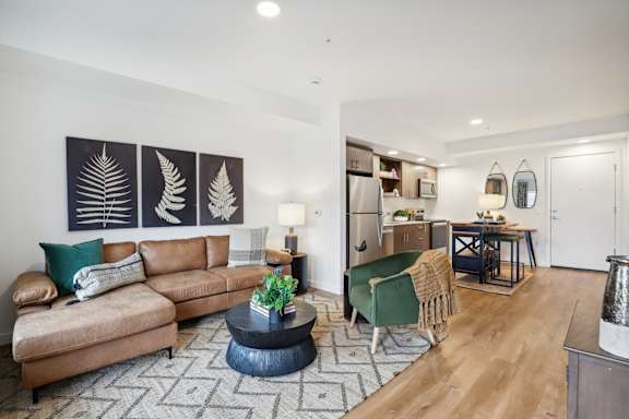 a living room with a couch and a table