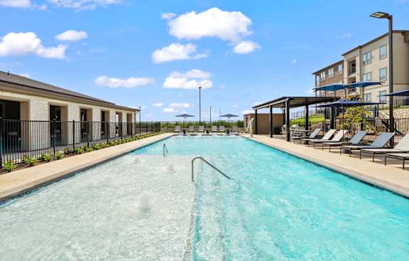 our apartments have a large resort style pool with lounge chairs