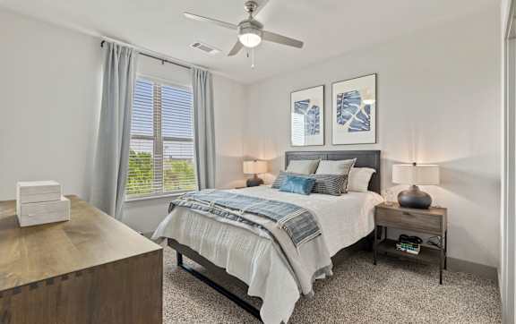 Axis Marketplace Apartments in Kyle, Texas Model Bedroom with Carpet