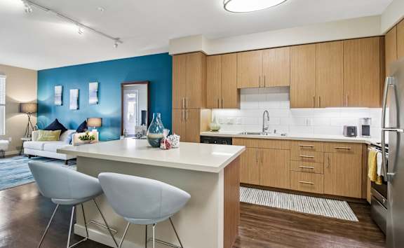 Santa Clara CA Luxury Apartments-Spacious Bedroom With Cozy Carpets, Modern Features, and Large Windows for Natural Light In The Apartment