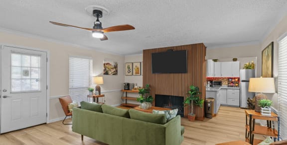 an empty kitchen with white cabinets and stainless steel appliances