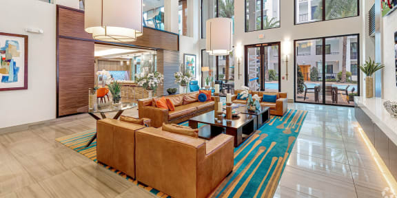 a large lobby with couches and a coffee table