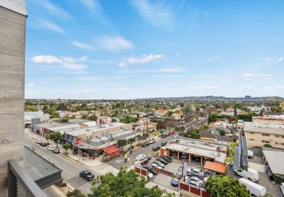 a view of the city from the top of a building at The Fairfax Flats Apartments, Los Angeles, CA, 90019