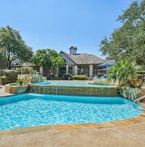 a swimming pool with beach chairs